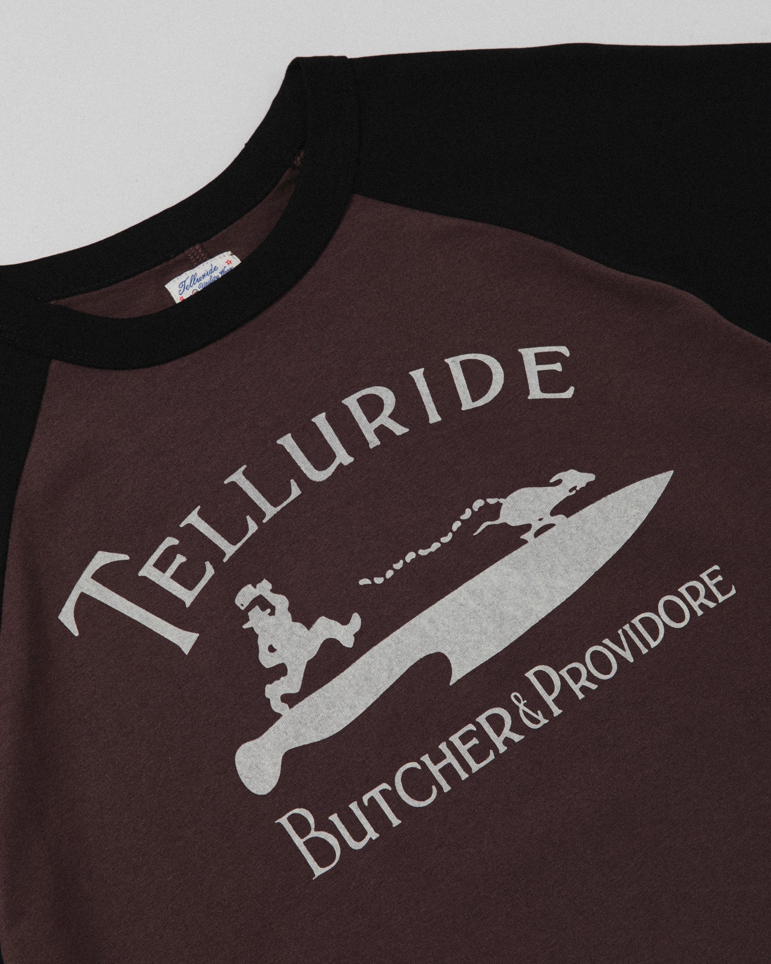TELLURIDE SPINE RAGLAN TEE THE BUTCHER - PLUM/BLACK