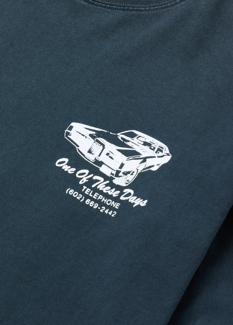 ONE OF THESE DAYS TIRE SERVICE LONG SLEEVE TEE - WASHED BLACK